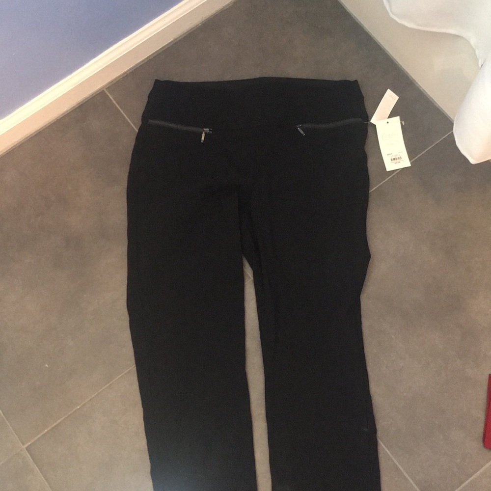 Black dress pants with zipper detail on front